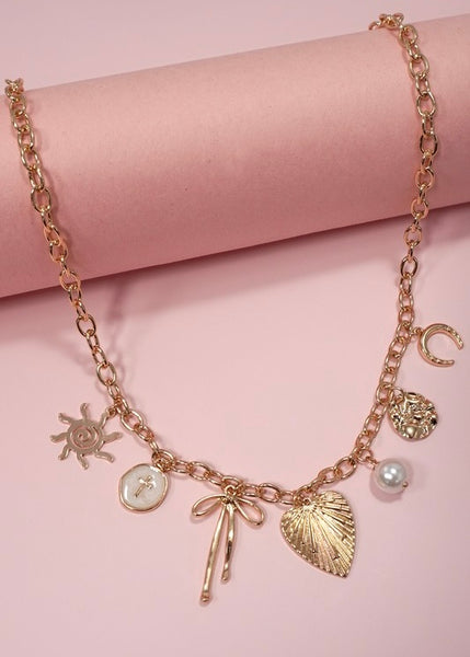 Sun Bow Pearl Cross Charm Necklace