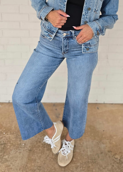Sawyer Mid Rise Wide Leg Raw Hem Jeans