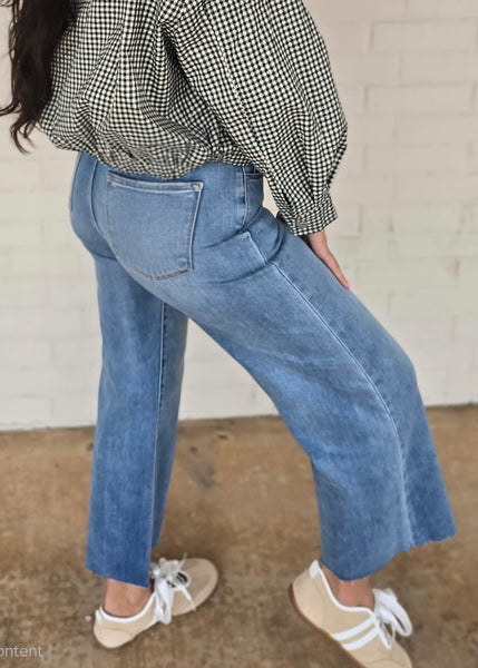 Sawyer Mid Rise Wide Leg Raw Hem Jeans