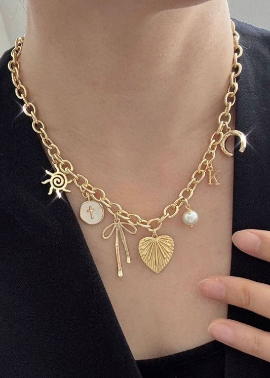 Sun Bow Pearl Cross Charm Necklace