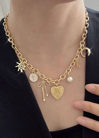 Sun Bow Pearl Cross Charm Necklace