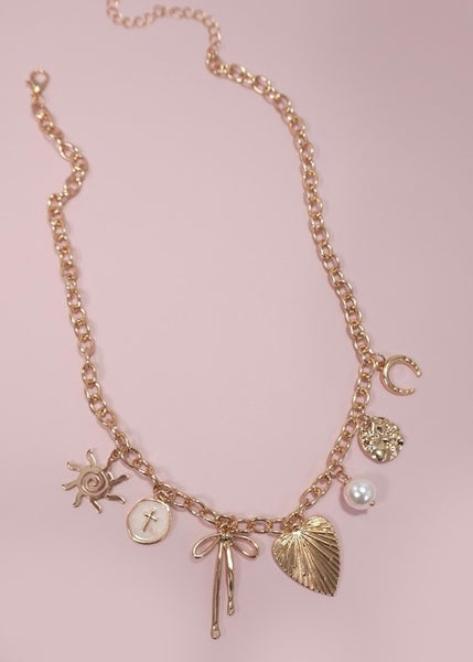 Sun Bow Pearl Cross Charm Necklace