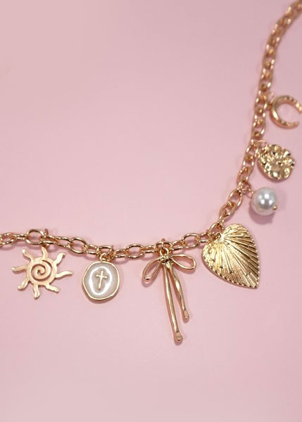 Sun Bow Pearl Cross Charm Necklace