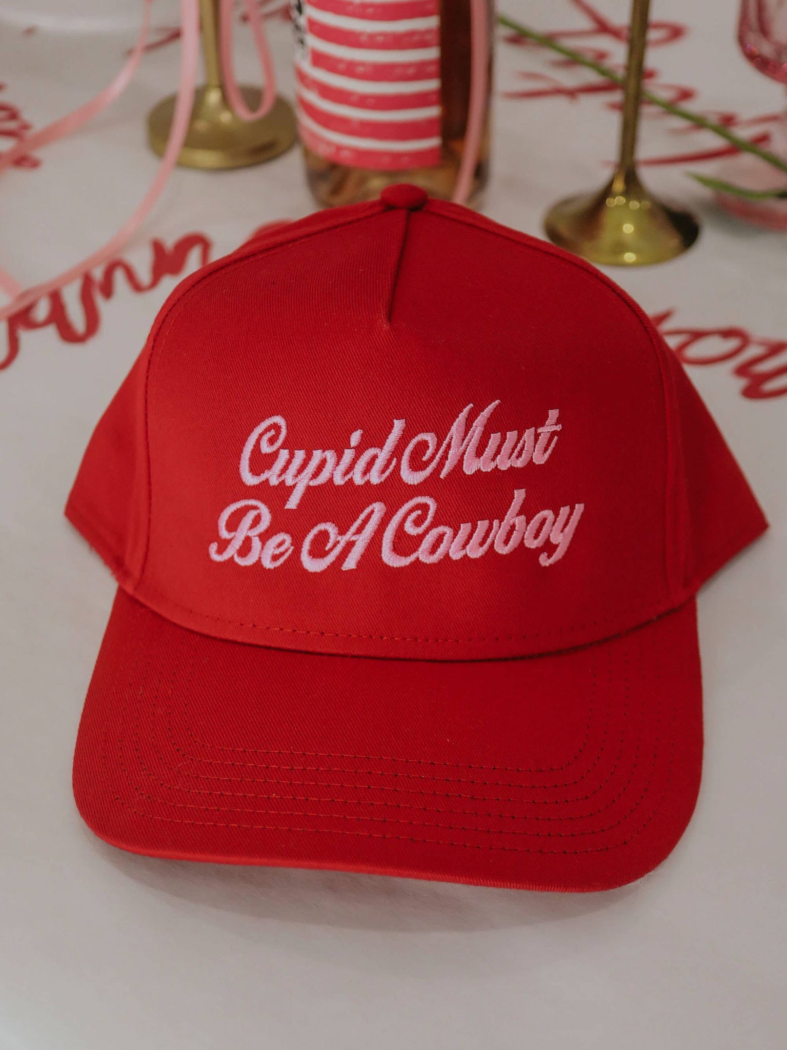 Cupid Must Be A Cowboy Trucker Hat